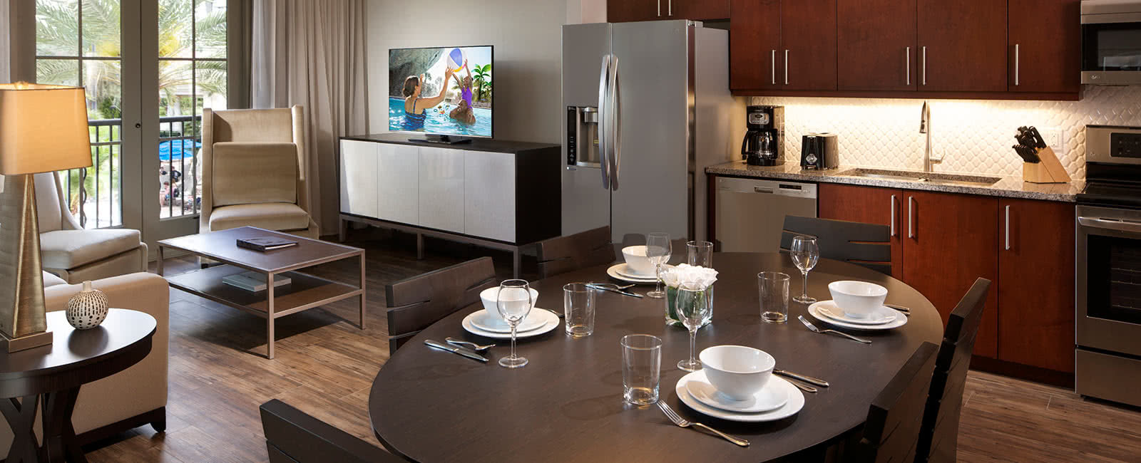 Dining Area and Kitchen at Las Palmeras, a Hilton Grand Vacations Club in Orlando, Florida